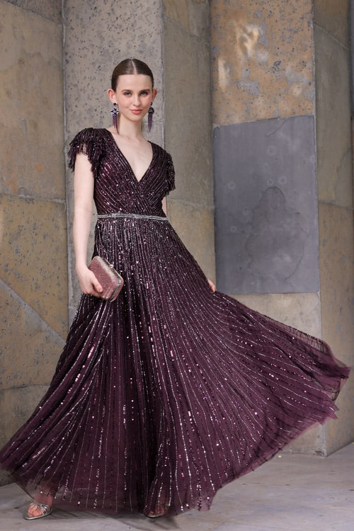 Full view of sequin embellishment on blackberry fabric