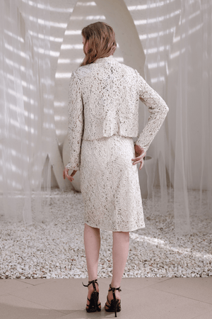 Ivory lace dress side profile showing elegant knee-length silhouette