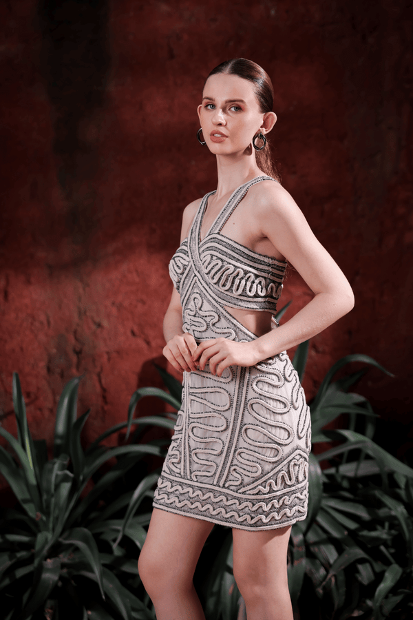 Close-up of hand-applied embellishments and cut-out design on Edition Two mini dress – premium craftsmanship