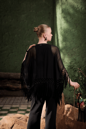 Back view of Edition Two black beaded fringe cape – flowing fringe hem and open-front cape design for modern festive look