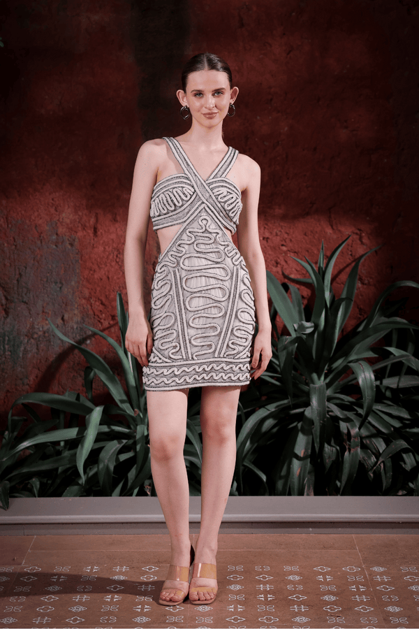 Lifestyle shot: woman wearing Edition Two embellished cut-out mini dress at event – modern designer party look India