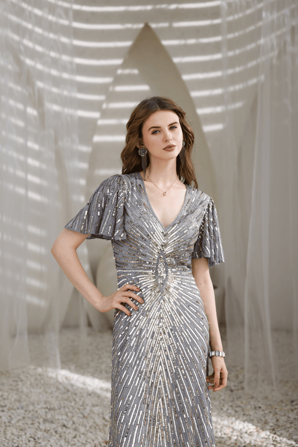 Close-up of hand-beaded sequins and bugle beads on Edition Two silver gown – premium craftsmanship