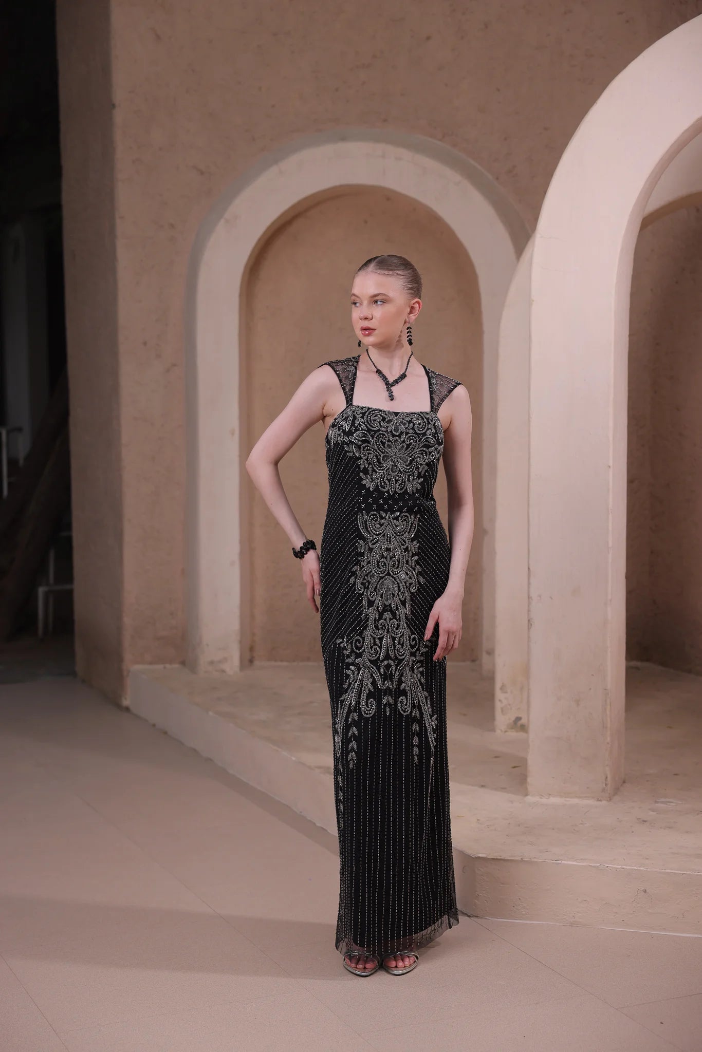 Black Beaded Evening Gown with Baroque Detailing Black Beaded Evening Gown with Baroque Detailing