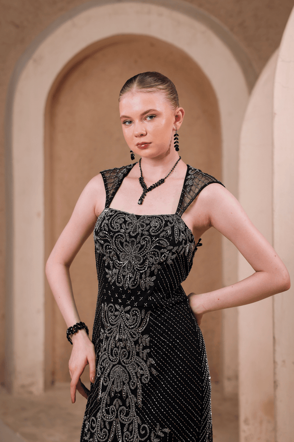 Close-up of hand-embellished baroque-inspired beadwork on Edition Two black evening gown – premium craftsmanship