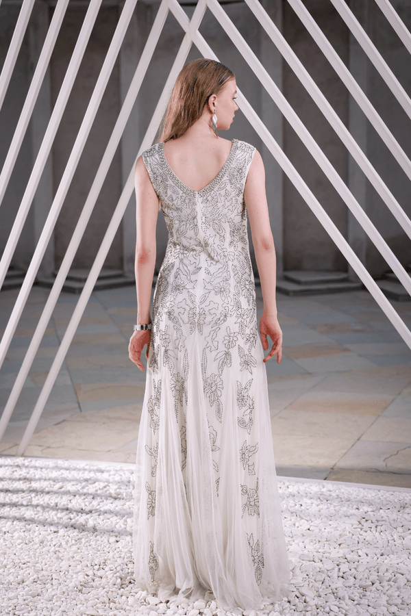 Back view of Edition Two ivory embellished floor-length gown – elegant train and detailed beadwork