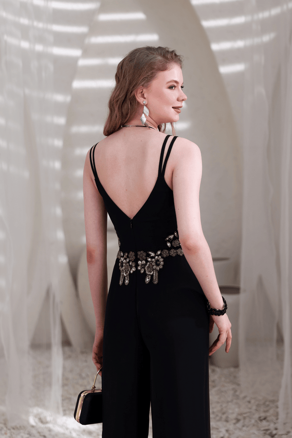 Back angle of black wide-leg jumpsuit – elegant eveningwear style