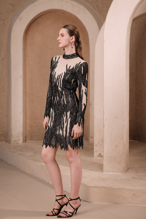 Close-up of flame-inspired black bead and sequin embroidery on Edition Two illusion dress – premium craftsmanship