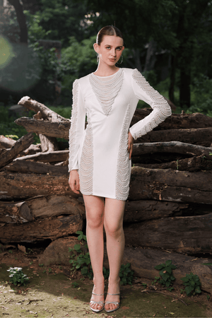 Full view of hand-applied pearl embellishments on Edition Two ivory mini dress – luxury craftsmanship