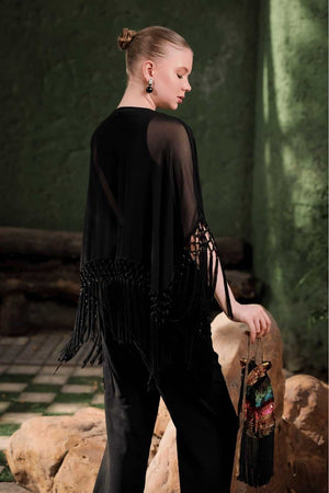 Side angle of Edition Two black beaded fringe cape – sheer georgette silhouette with tonal bead and sequin embroidery