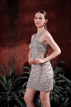 Close-up of hand-applied embellishments and cut-out design on Edition Two mini dress – premium craftsmanship