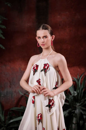 Close-up of hand-embroidered floral motifs on ivory halter dress by Edition Two – premium women’s designer craftsmanship