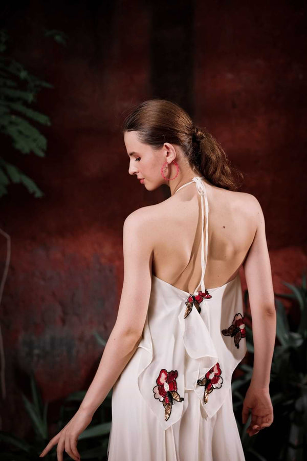 Back view of Edition Two ivory halter dress with hand-embroidered florals – low back design and floral embroidery extending to hem