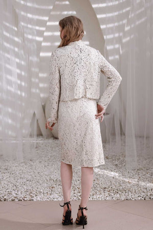 Ivory lace dress side profile showing elegant knee-length silhouette